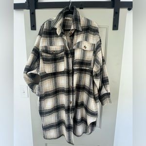 Tunic style flannel on the thinner side with pockets!